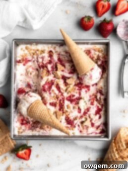 No Churn Strawberry Cheesecake Ice Cream in a square pan with cones