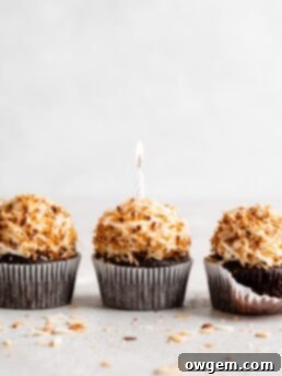 Chocolate coconut cupcakes are topped with a creamy coconut frosting and toasted coconut