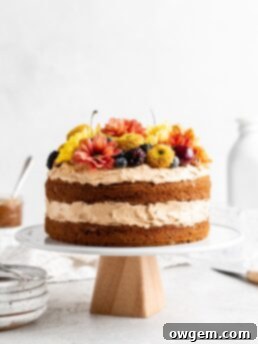 Decadent Brown Butter Pumpkin Cake with rich dulce de leche Russian buttercream frosting, ready to be served.