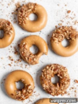Baked Spiced Brown Sugar Donuts with Maple Glaze and Pecans
