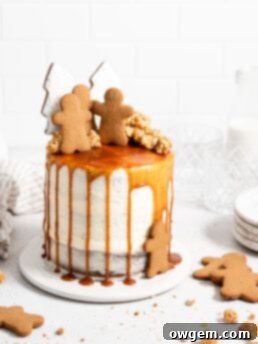 Naked style gingerbread layer cake with cream cheese frosting and salted caramel drip