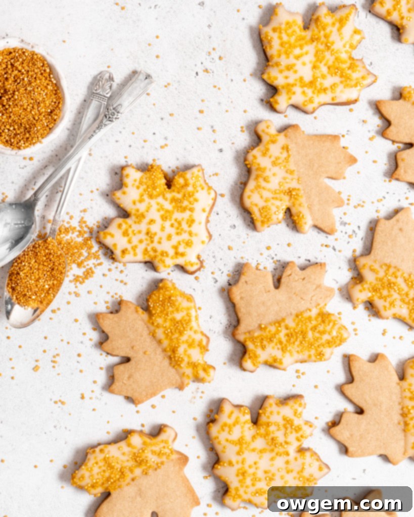 maple sugar cookies with maple butter glaze and decorated with golden sugar sprinkles
