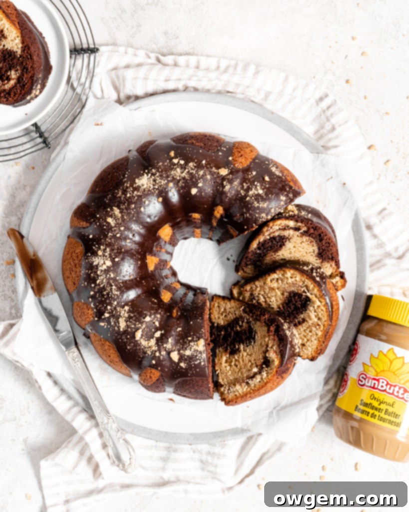 Close-up of a slice of SunButter chocolate marble bundt cake showing the beautiful swirl pattern