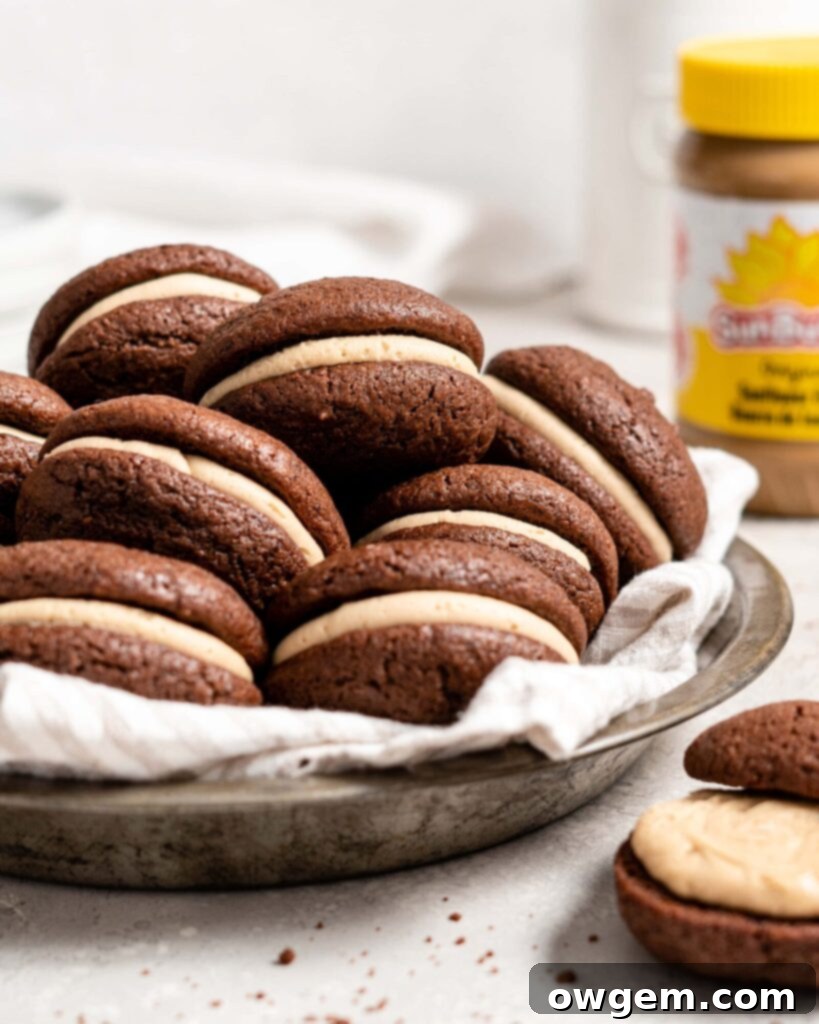A stack of three SunButter Chocolate Whoopie Pies, showing their plump, inviting appearance.