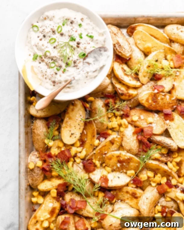 Warm potato salad with crispy bacon, roasted corn, and fresh chives.