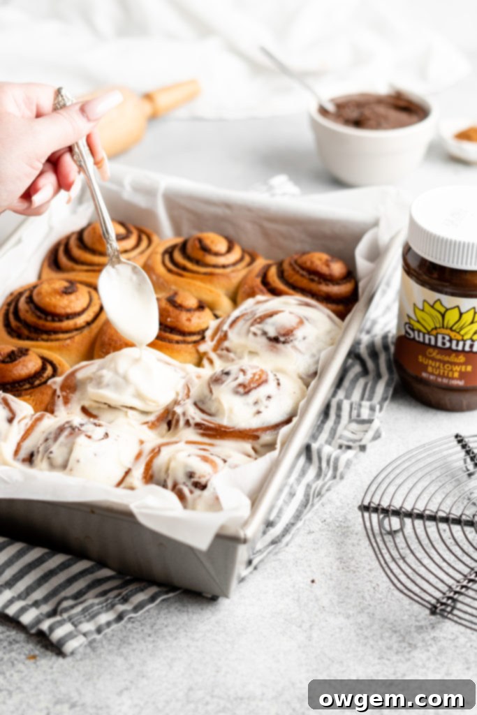 fluffy cinnamon rolls filled with peanut-free chocolate sunbutter spread to create Chocolate SunButter Cinnamon Rolls