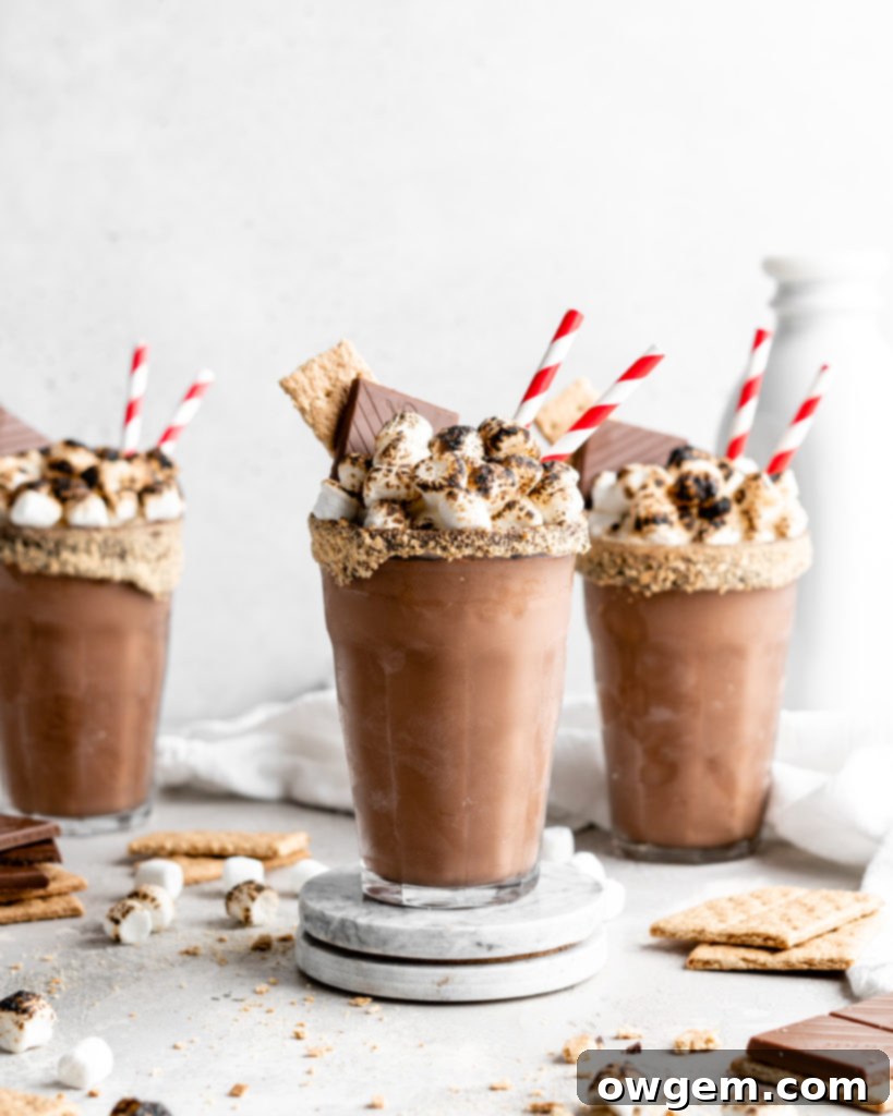 The process of blending the SunButter S'mores Milkshake ingredients in a blender, showing the creamy texture forming.