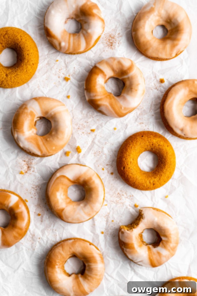 Side view of a marble glazed pumpkin spice latte donut