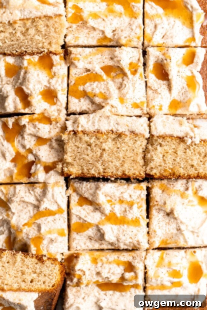 Bourbon Eggnog Sheet Cake with fluffy eggnog frosting, drizzled with caramel sauce
