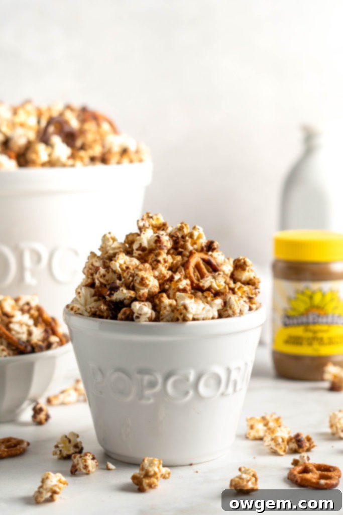 Sweet SunButter Caramel Popcorn mixed with salty pretzels and creamy chocolate