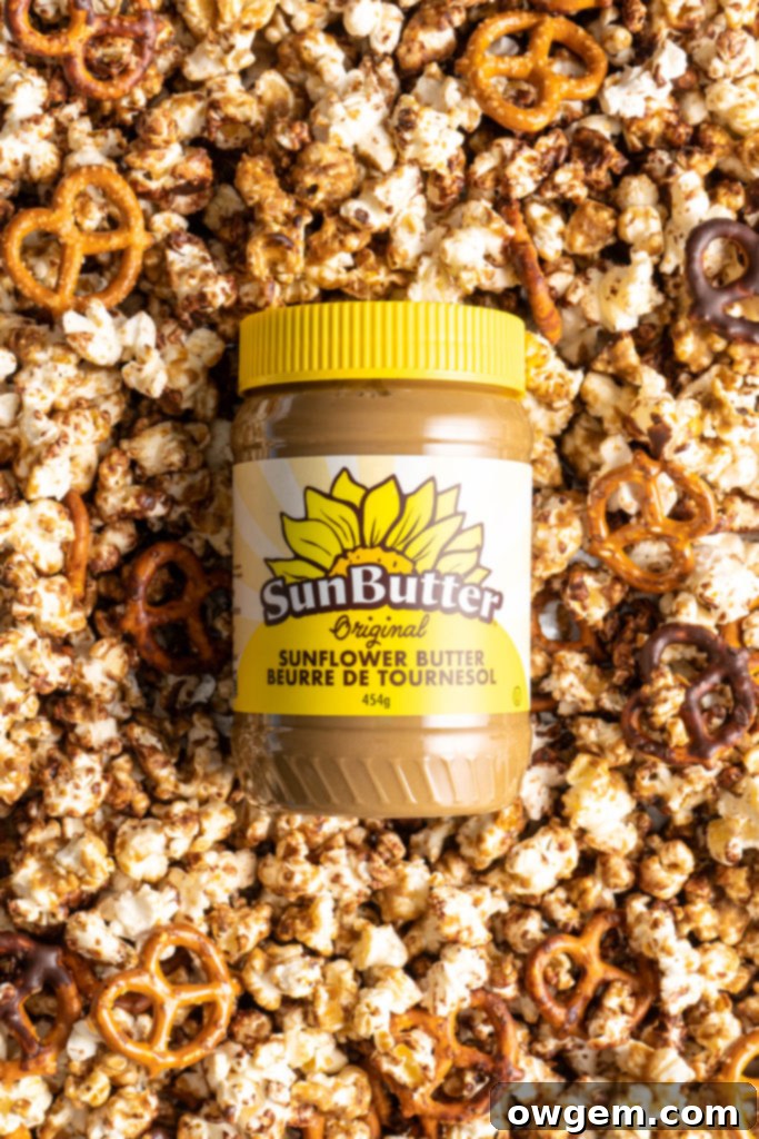 Sweet SunButter Caramel Popcorn mixed with salty pretzels and creamy chocolate