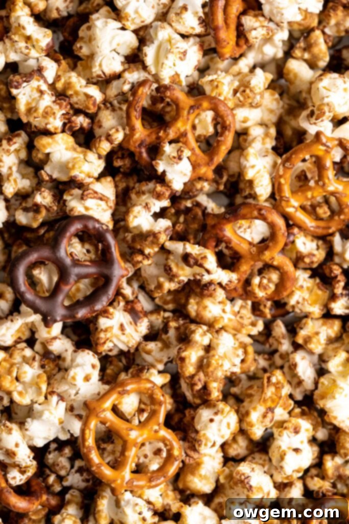 Sweet SunButter Caramel Popcorn mixed with salty pretzels and creamy chocolate