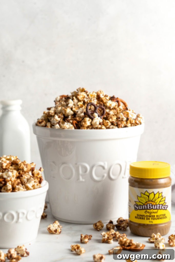 Sweet SunButter Caramel Popcorn mixed with salty pretzels and creamy chocolate