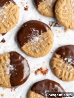 Chocolate dipped chewy SunButter cookies