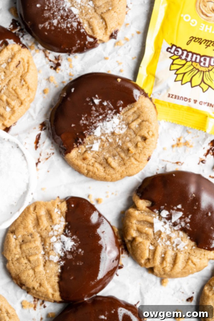 Chocolate dipped chewy SunButter cookies