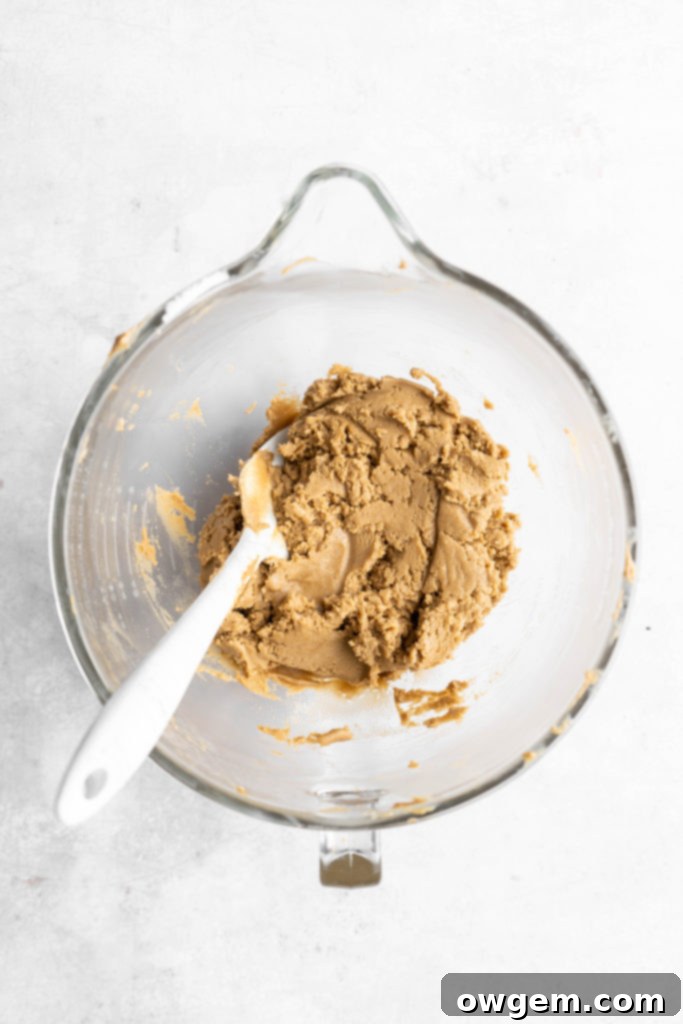SunButter cookie batter in a stand mixer bowl