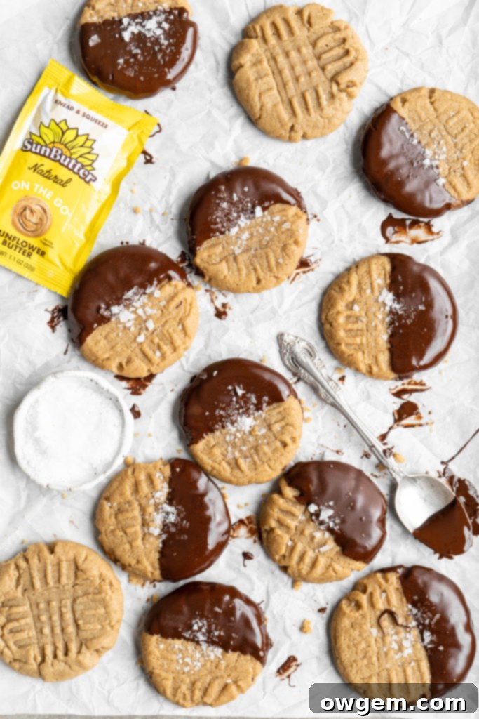 Chocolate dipped chewy SunButter cookies