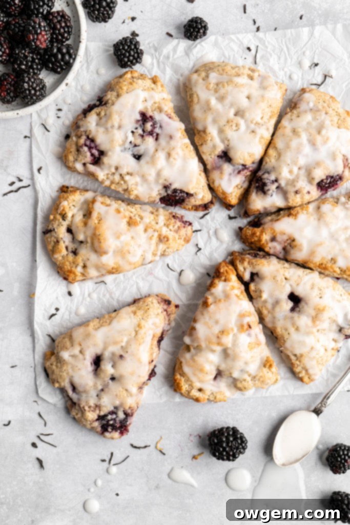 Delicious blackberry earl grey scones covered in vanilla glaze