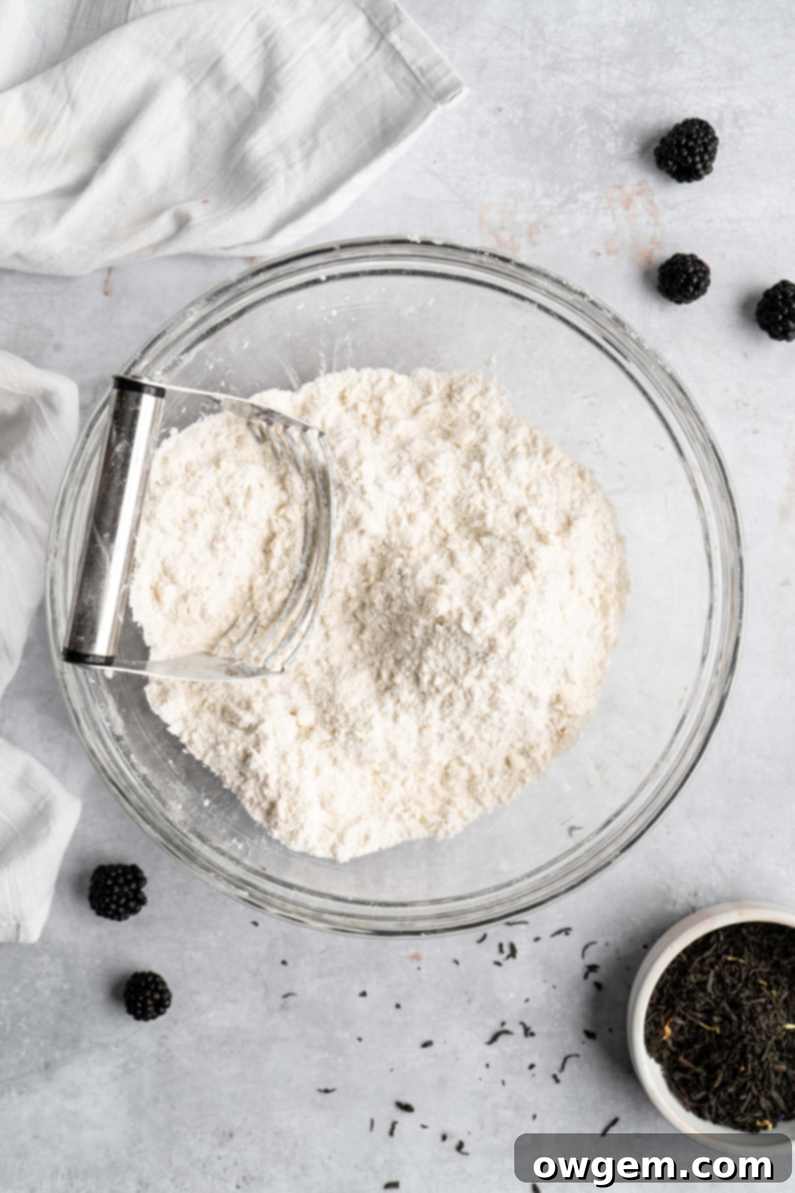 scones: cold butter being cut into flour mixture