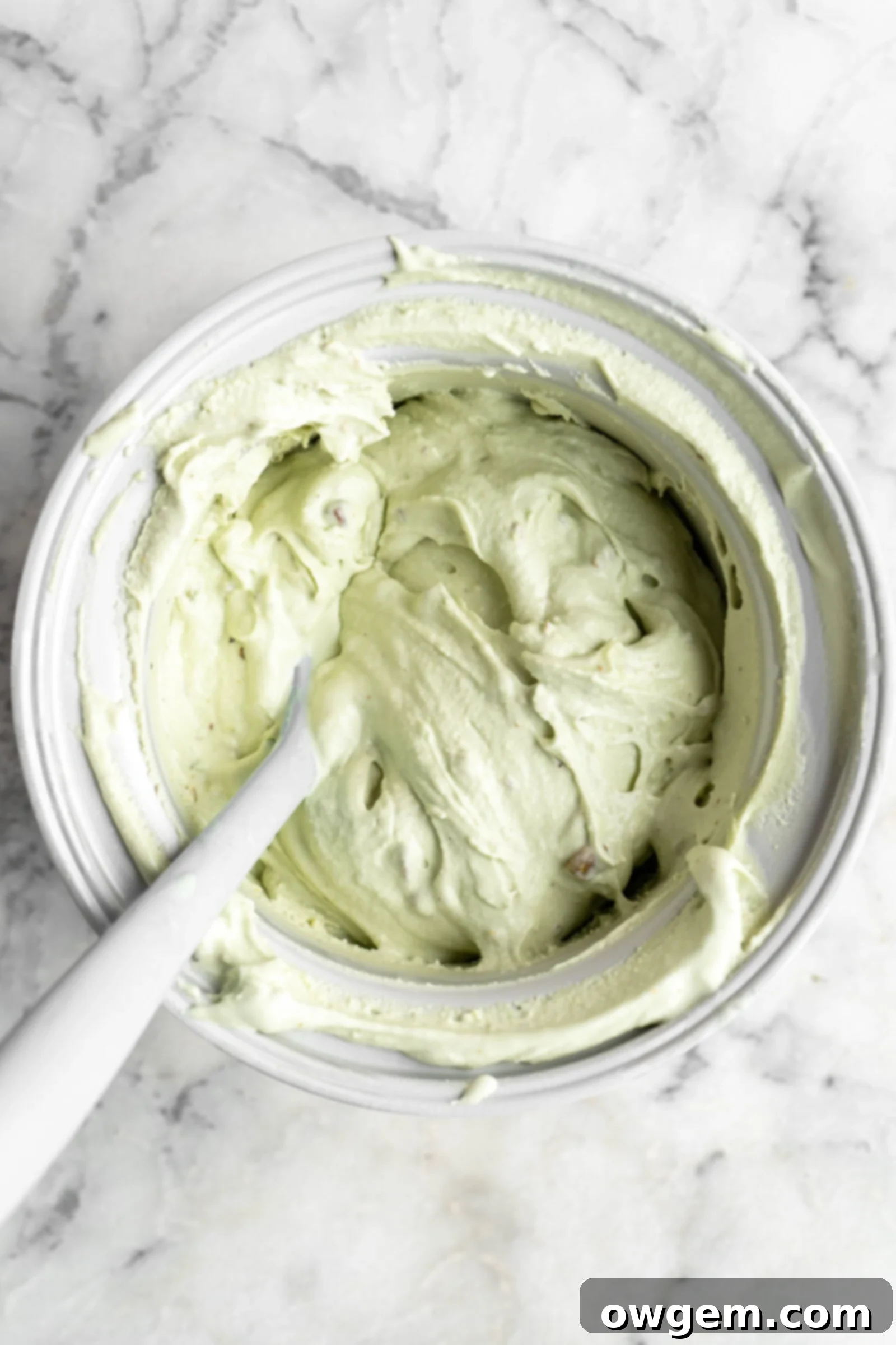 churned pistachio ice cream in ice cream maker