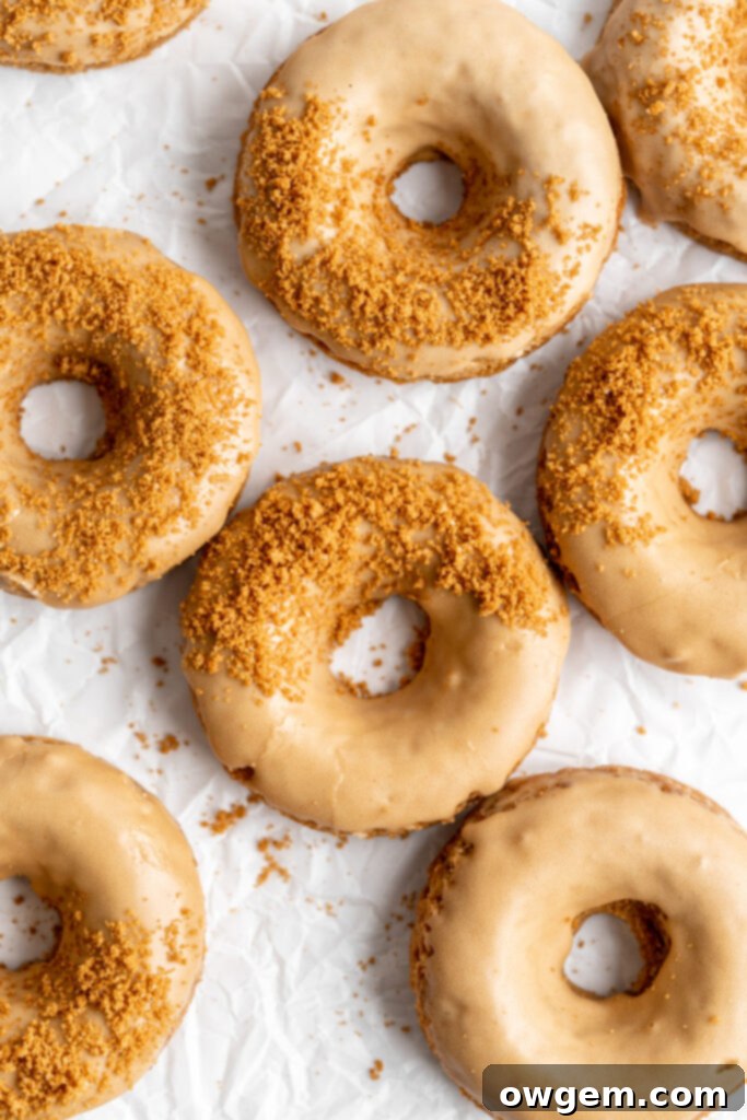 Coffee donuts with coffee glaze sprinkled with crushed biscoff cookies