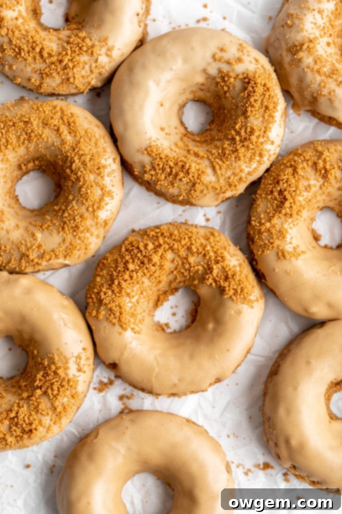 Coffee donuts with coffee glaze sprinkled with crushed biscoff cookies