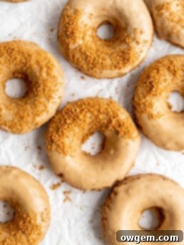 Coffee donuts with coffee glaze sprinkled with crushed biscoff cookies