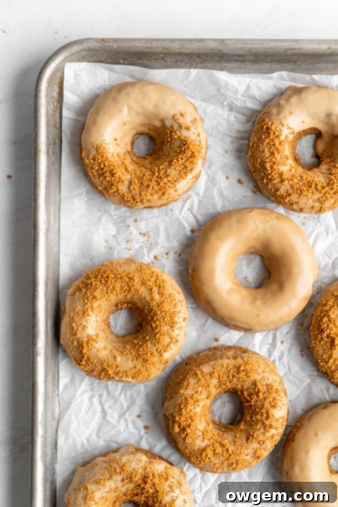 Coffee donuts with coffee glaze sprinkled with crushed biscoff cookies
