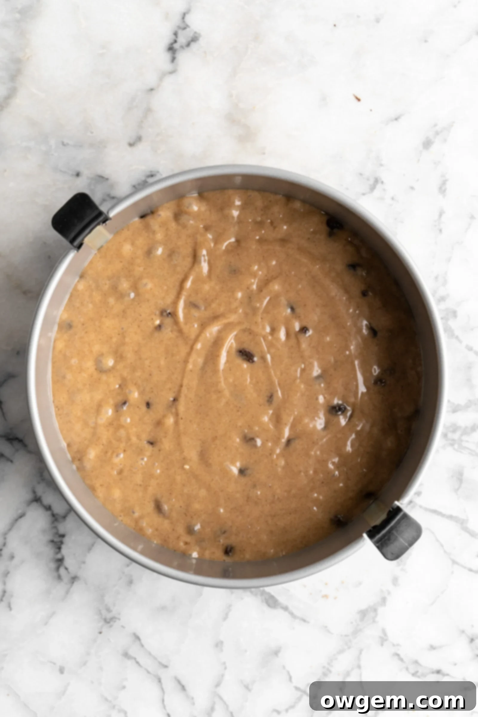 Spice cake batter in cake pan.