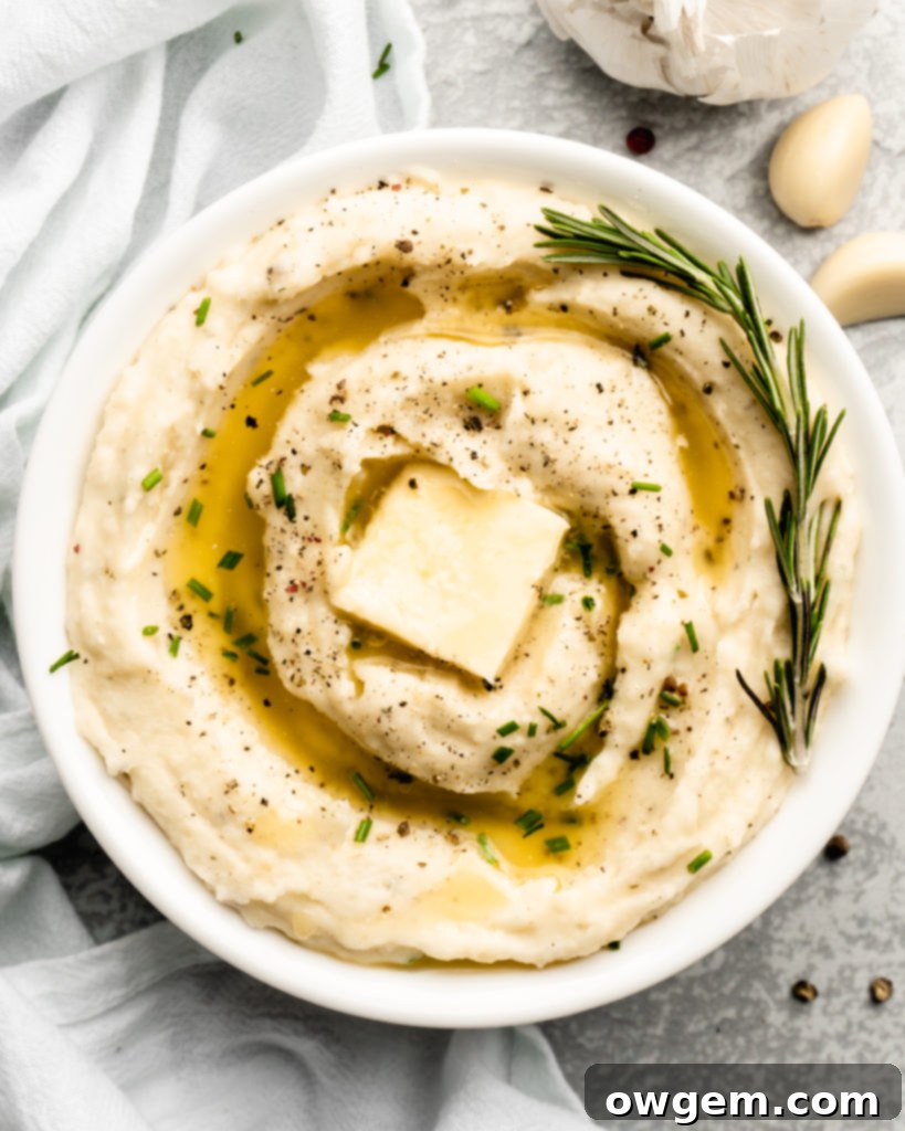 Super creamy buttery garlic mashed potatoes, topped with chives