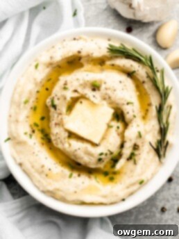 Super creamy buttery garlic mashed potatoes, topped with chives