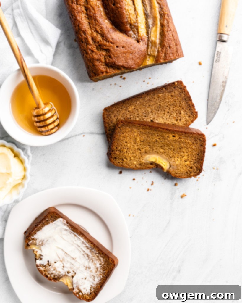 Moist and delicious golden banana bread is made with browned butter and bourbon, and baked to perfection.