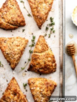 Savory bacon gruyere breakfast scones are flaky, savory, and delicious. Serve with butter or a bit of honey.